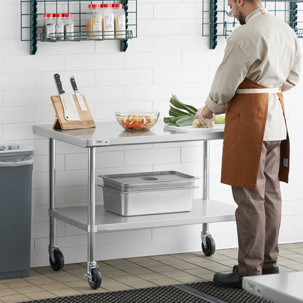 Bàn thao tác thép không gỉ 304 16 gauge có kệ dưới và bánh xe Regency 76 x 122 cm