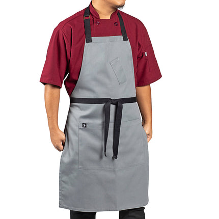 Tạp dề yếm vải poly-cotton có thể tùy chỉnh Uncommon Chef 3128 Surge xám, dây viền đen và 3 túi