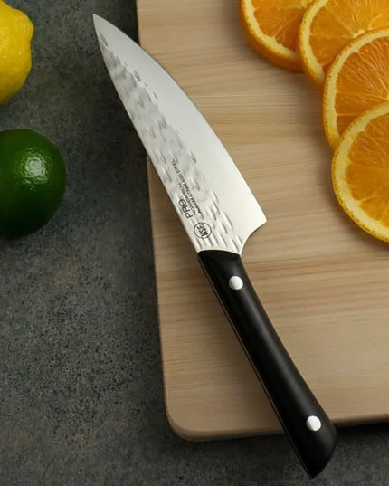 Dao Đầu Bếp Kai HT7066 20.3 cm Cán POM Đen Lưỡi Thép Không Gỉ