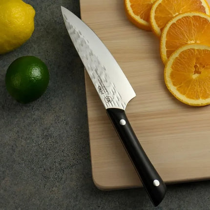 Dao Đầu Bếp Kai HT7066 20.3 cm Cán POM Đen Lưỡi Thép Không Gỉ