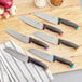 Dao Santoku lưỡi Granton Schraf 18 cm cán TPRgrip nâu