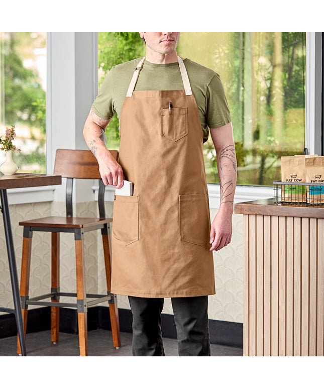 Tạp dề yếm vải 100% cotton có thể tùy chỉnh Uncommon Chef 3104 Rebel nâu caramel, dây viền tự nhiên và 3 túi