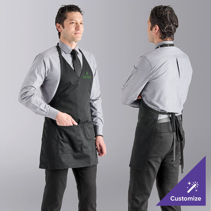 Tạp dề tuxedo cổ V vải twill poly-cotton có thể tùy chỉnh Uncommon Chef 3041 đen, dây cổ điều chỉnh và 2 túi