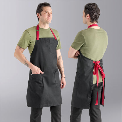 Tạp dề yếm vải poly-cotton có thể tùy chỉnh Uncommon Chef 3104 Rebel đen, dây viền đỏ và 3 túi