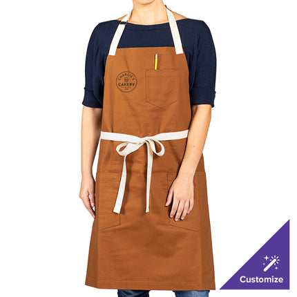 Tạp dề yếm vải canvas 100% cotton có thể tùy chỉnh Uncommon Chef 3115 Vibe nâu óc chó, dây viền tự nhiên và 3 túi